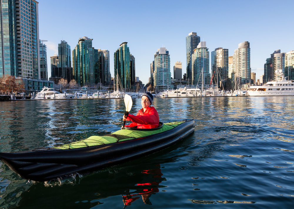 Picture of a man in a kayak on Vancouver False Creek